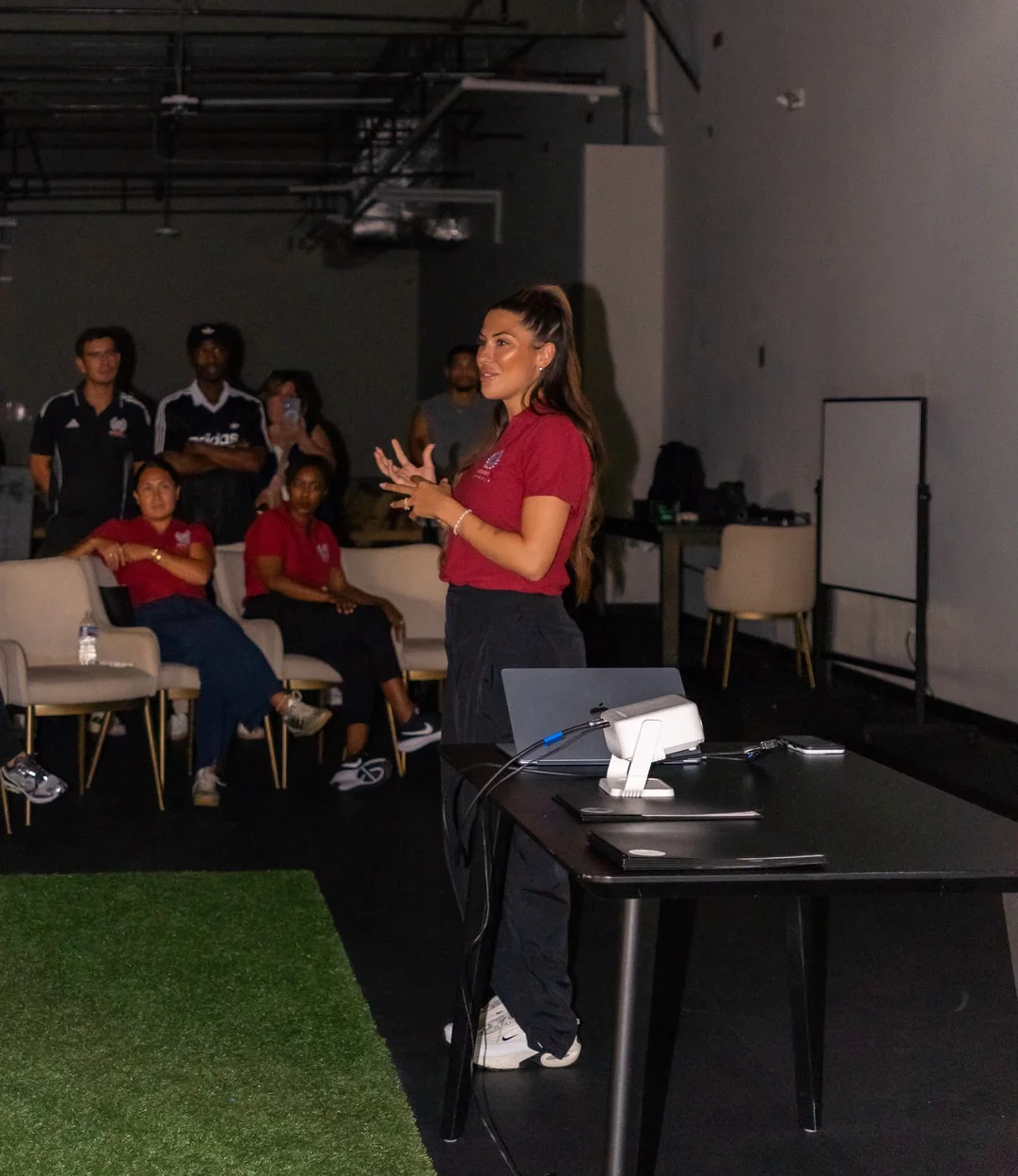 Jessica leading a mental performance session with a group of athletes