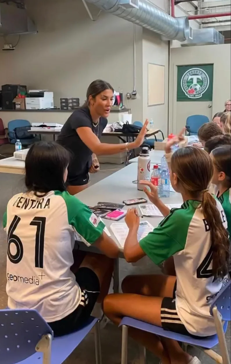 Jessica practicing a mental performance exercise with athletes